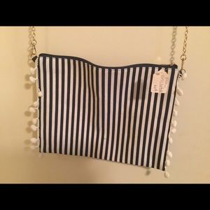 Navy white clutch with poms